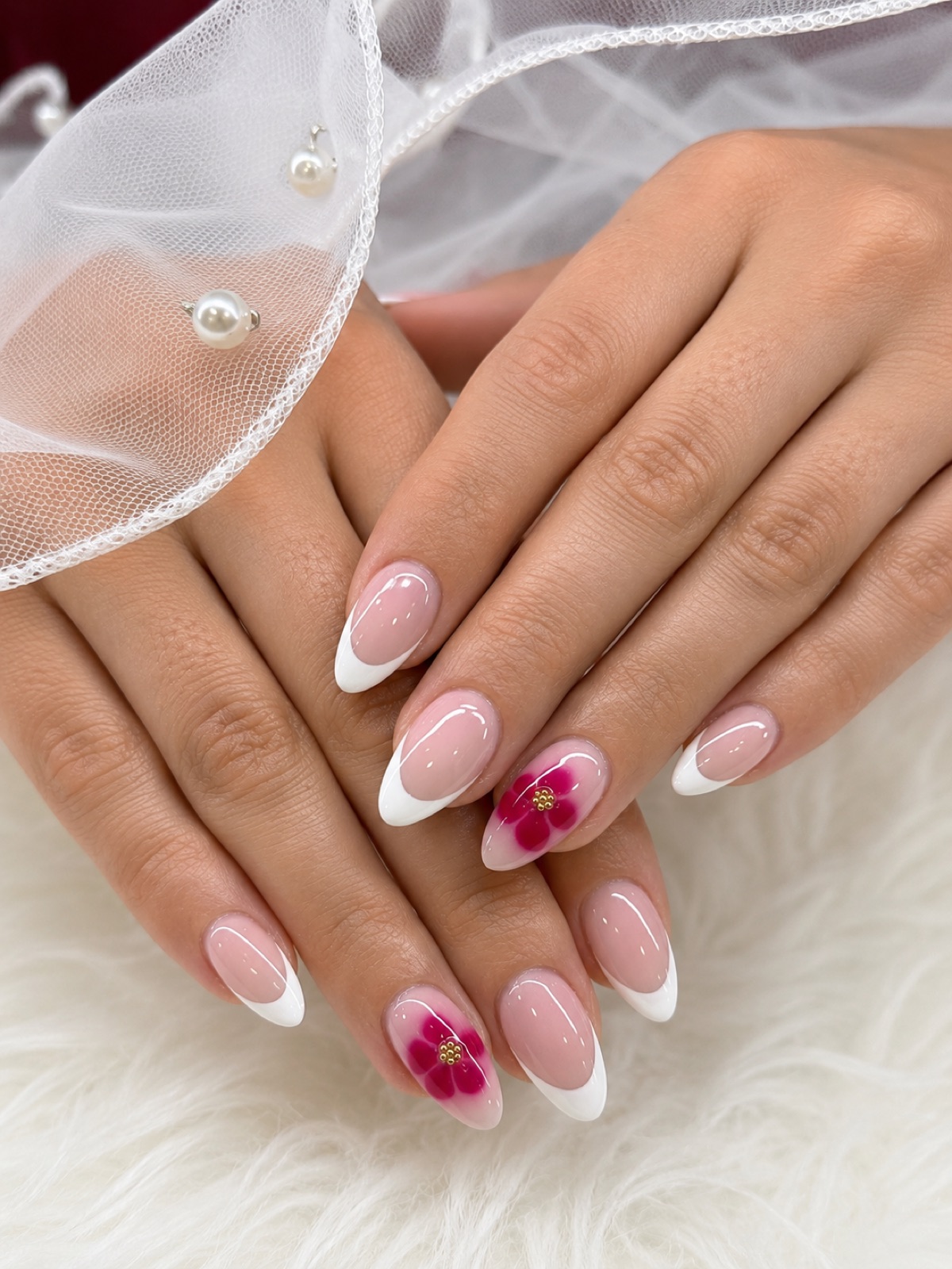 Bridal French manicure with burgundy 3D flowers