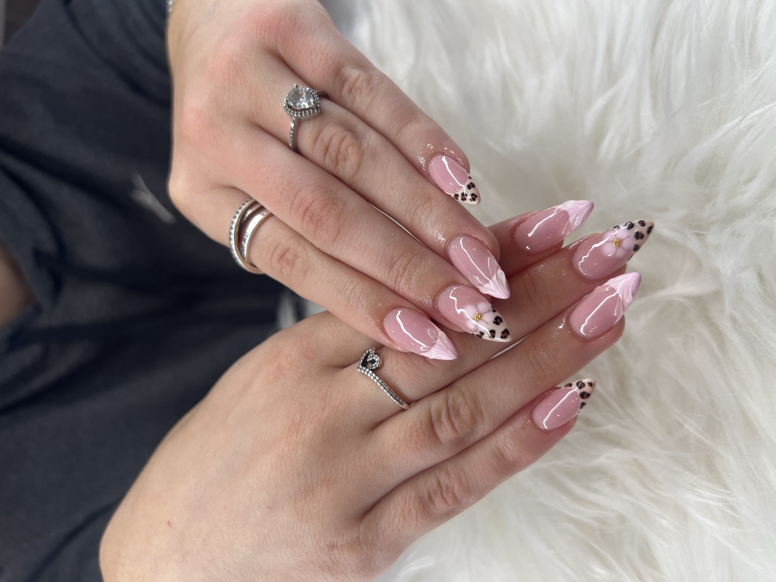 French tip nails with leopard print and 3D flower